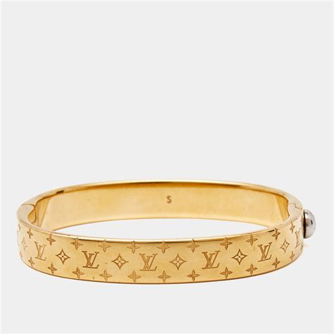 louis vuitton nanogram cuff fake|louis vuitton magnet bracelet.